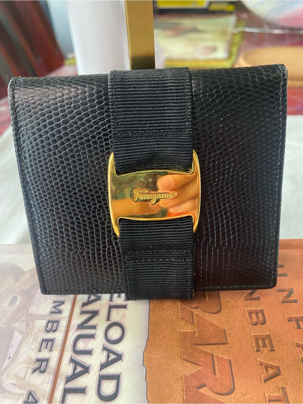 Salvatore Ferragamo Black Lizard-Embossed Wallet with Gold Logo Buckle